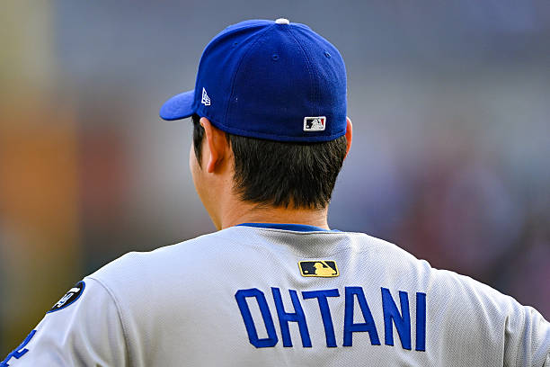 Los Angeles designated hitter Shohei Ohtani warms up prior to the start of the MLB game between the Los Angeles Dodgers and the Atlanta Braves on May...