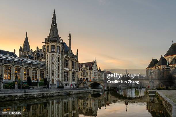 historic center of ghent at dawn - the city skyline and the sint-michielsbrug - gent stockfoto's en -beelden