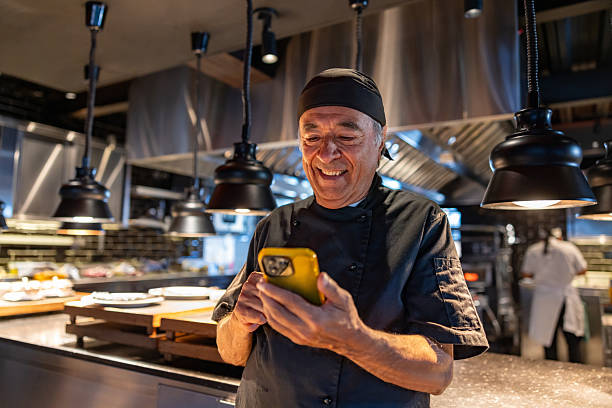 Chef Phone 1,230 Chef Talking On Phone In Kitchen Stock Photos, High-Res Pictures ...