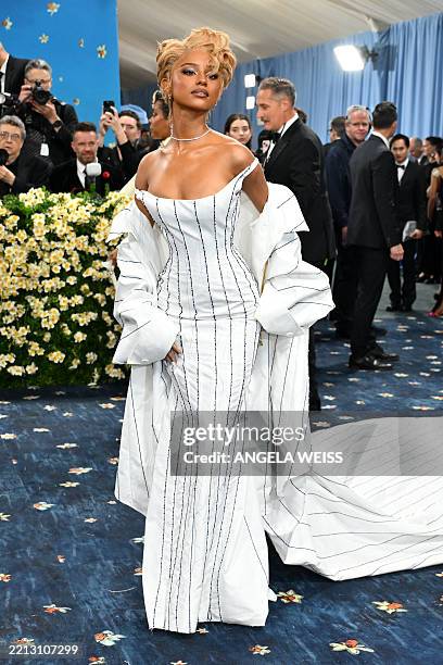 South African singer-songwriter Tyla arrives for the 2025 Met Gala at the Metropolitan Museum of Art on May 5 in New York. The Gala raises money for...