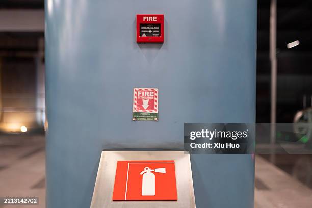 fire extinguishers and fire alarms in subway stations - osha hazard communication pictogram stock pictures, royalty-free photos & images