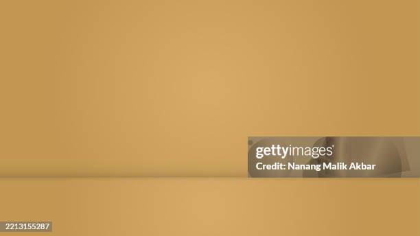 empty studio room with shadow and table for showing products - yellow studio background stock illustrations