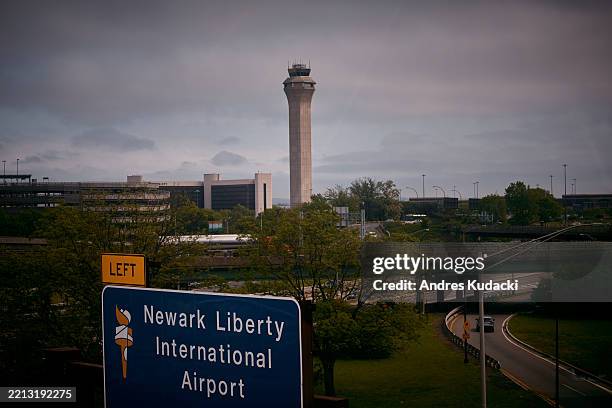 An airport control tower is seen at Newark Liberty International Airport, on May 6, 2025 in Newark, New Jersey. Passengers traveling to, from, or...