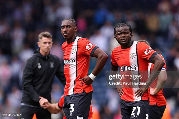 Amari'i Bell and Millenic Alli of Luton Town look dejected after defeat confirmed the teams relegation to Sky Bet League One in the Sky Bet...
