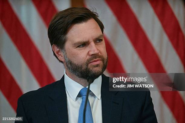 Vice President JD Vance attends a meeting of the White House Task Force on the FIFA World Cup 2026, in the East Room of the White house in...