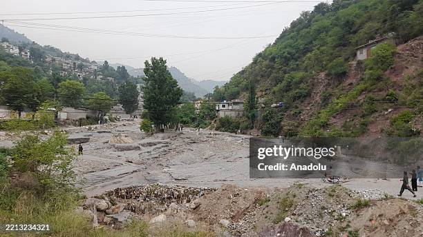 Citizens gather in the area of the Bilal Mosque destroyed in Indian attack in Muzaffarabad, Jammu and Kashmir, Pakistan on May 7, 2025.