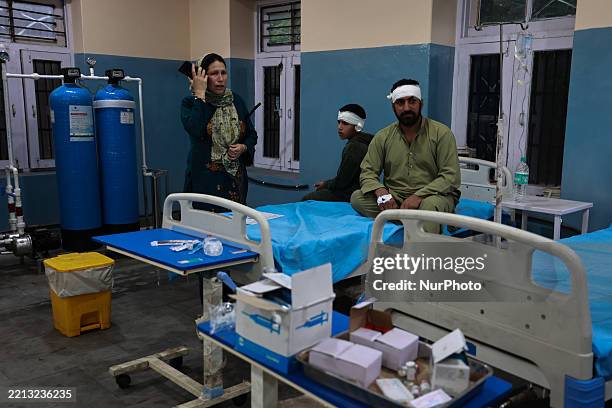 Injured individuals are treated at a hospital in Uri, Jammu and Kashmir, India, on May 7, 2025. Civilians tend to their injuries following Pakistani...