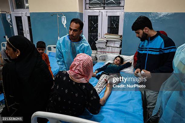 Civilians tend to their injuries following Pakistani shelling in Baramulla district. The Indian military says early Wednesday it launches strikes...
