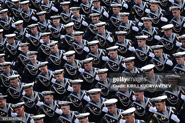 Russian sailors get ready for the general rehearsal of the Victory Day military parade, to be held at Red Square, in central Moscow on May 7, 2025....