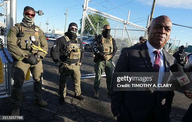 Mayor Ras Baraka of Newark speaks to the press near ICE agents at a demonstration outside an immigrant detention centre in Newark, New Jersey May 7,...