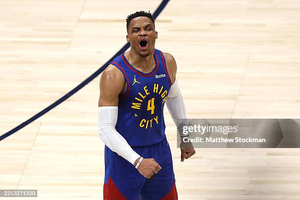 Russell Westbrook of the Denver Nuggets reacts after dunking the ball against the LA Clippers during the fourth quarter in Game Seven of the Western...