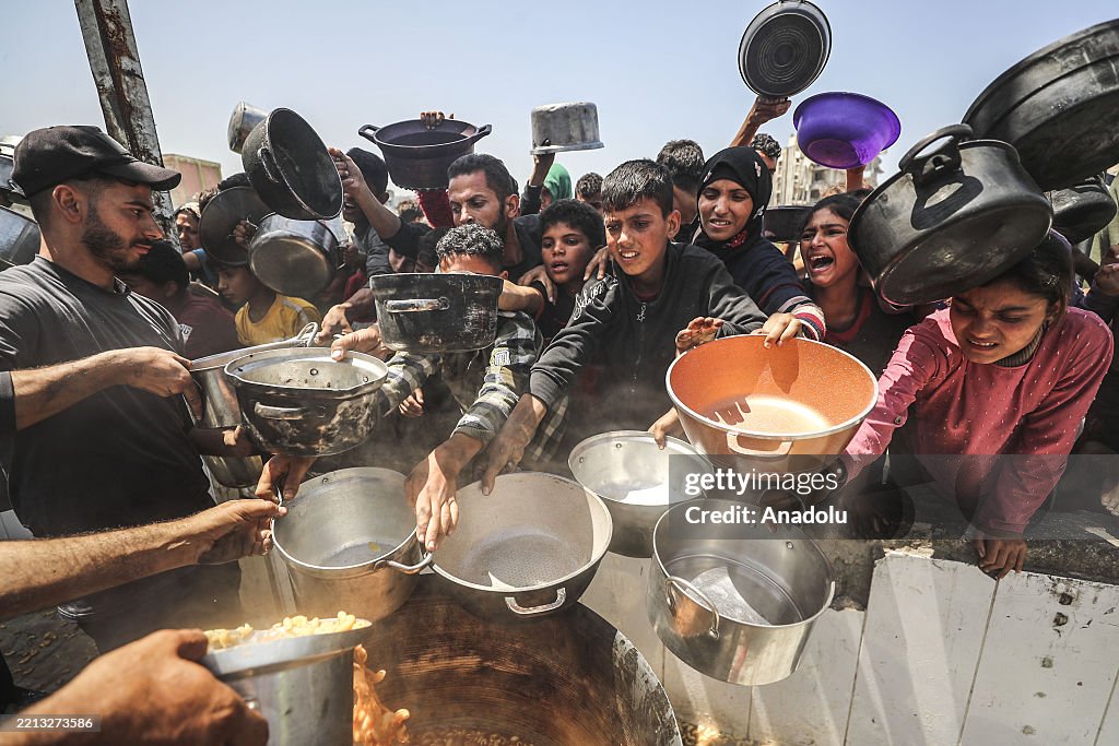 Food distributed to Palestinians, including children in Gaza amid Israeli attacks