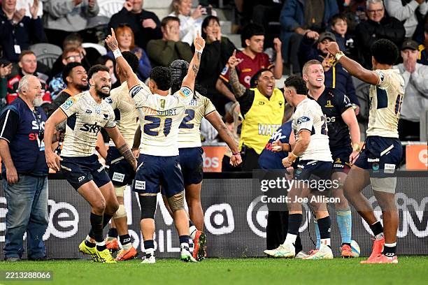 Moana Pasifika celebrate after winning the round 12 Super Rugby Pacific match between Highlanders and Moana Pasifika at Forsyth Barr Stadium, on May...