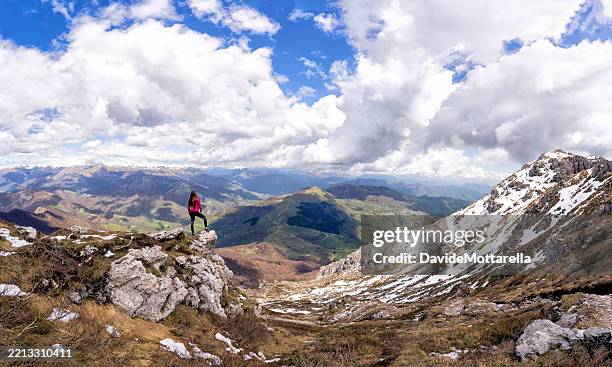 hiker overlooking the lombardy prealps from mount resegone - eco tourism stock pictures, royalty-free photos & images