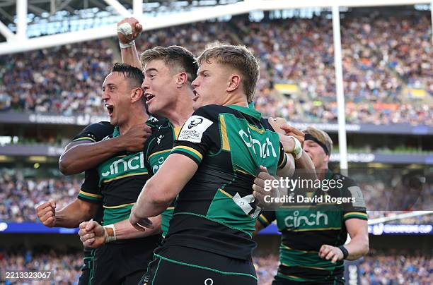 Alex Mitchell, Tommy Freeman and Fin Smith of Northampton Saints celebrate after their victory during the Investec Champions Cup semi-final match...