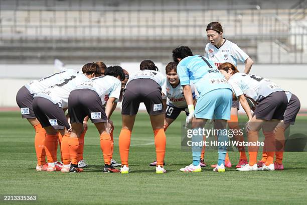 Players of Albirex Niigata Ladies huddle during the WE LEAGUE match between Mitsubishi Heavy Industries Urawa Red Diamonds Ladies and Albirex Niigata...