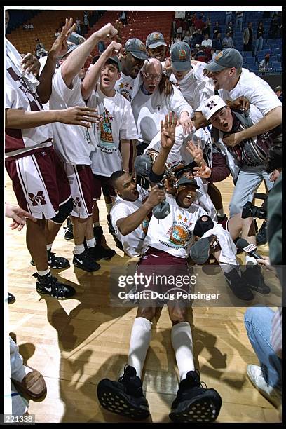 Forward Dontae' Jones of the Mississippi State Bulldogs celebrates with fans during a game against the Cincinnati Bearcats at Rupp Arena in...