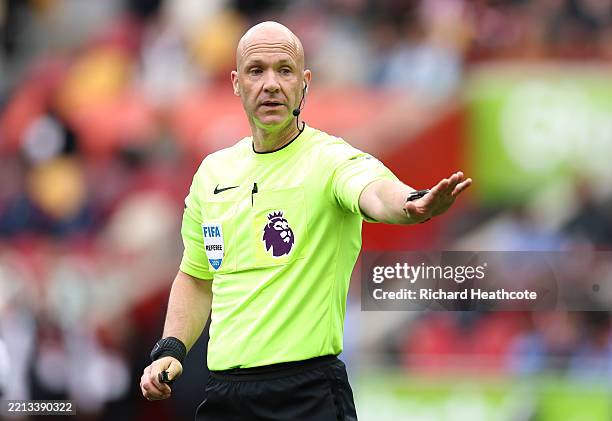 Referee Anthony Taylor in action during the Premier League match between Brentford FC and Manchester United FC at Brentford Community Stadium on May...