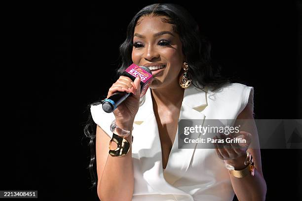 Drew Sidora speaks onstage during Day 2 of the 2025 Atlanta Ultimate Women's Expo at Gas South Arena on May 04, 2025 in Duluth, Georgia.