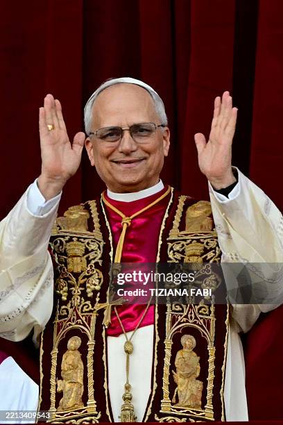 Newly elected Pope Leo XIV, Robert Prevost addresses the crowd on the main central loggia balcony of the St Peter's Basilica for the first time,...