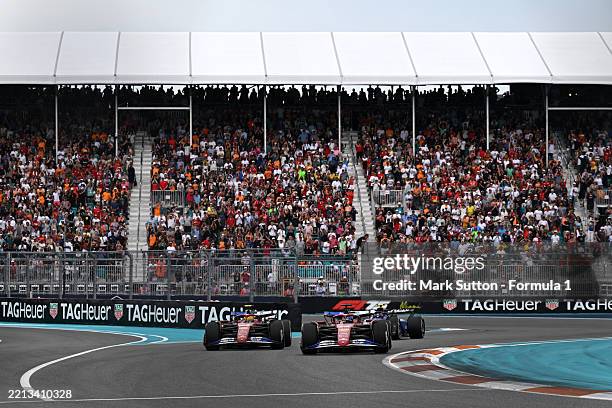 Charles Leclerc of Monaco driving the Scuderia Ferrari SF-25 leads Lewis Hamilton of Great Britain driving the Scuderia Ferrari SF-25 on track during...
