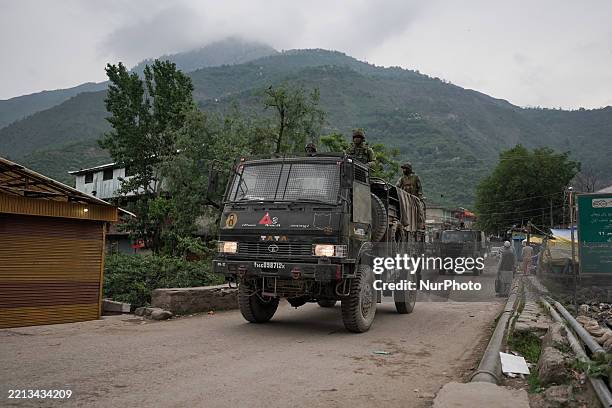 Indian troopers patrol in Uri town, Baramulla district, north of Srinagar, Indian-administered Kashmir, on May 8 after cross-border shelling between...