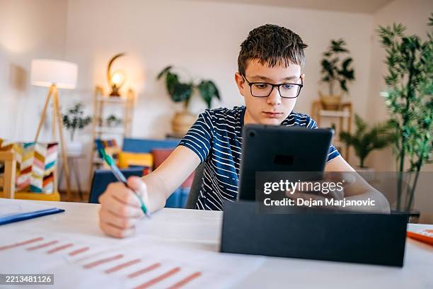 Boy Using Paper 59 Paper Boy Extra Stock Photos, High-Res Pictures, and Images - Getty ...