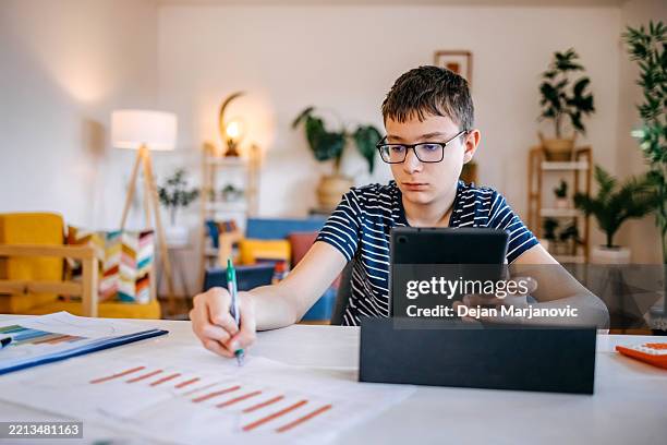 Boy Using Paper 59 Paper Boy Extra Stock Photos, High-Res Pictures, and Images - Getty ...