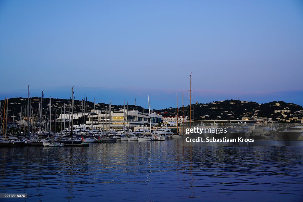 Vieux port and Cannes, Palais des Festivals et des Congrès, Dusk, France