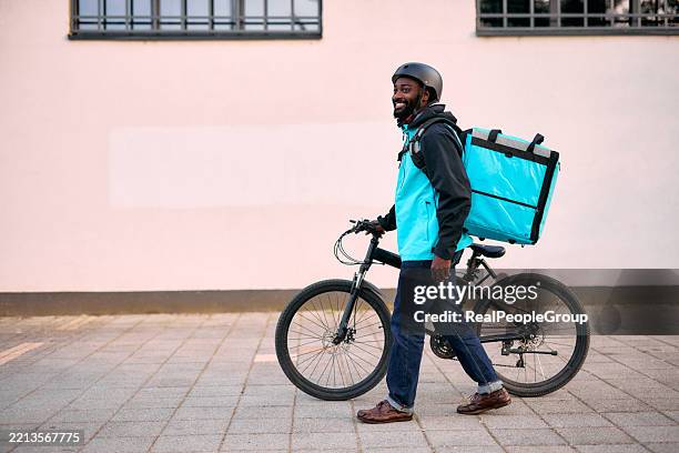 African Delivery Rider 610 African Delivery Rider Stock Photos, High-Res Pictures, and Images ...
