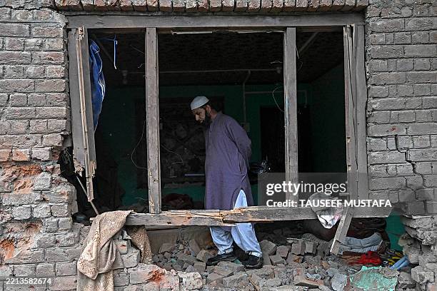 Local resident inspects his house that was damaged by Pakistani artillery shelling in Uri, about 100kms from Srinagar, on May 9, 2025. India said on...