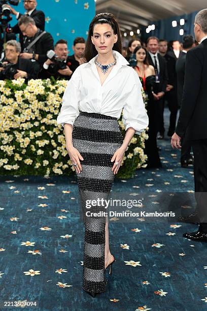 Anne Hathaway attends the 2025 Met Gala Celebrating "Superfine: Tailoring Black Style" at Metropolitan Museum of Art on May 05, 2025 in New York City.