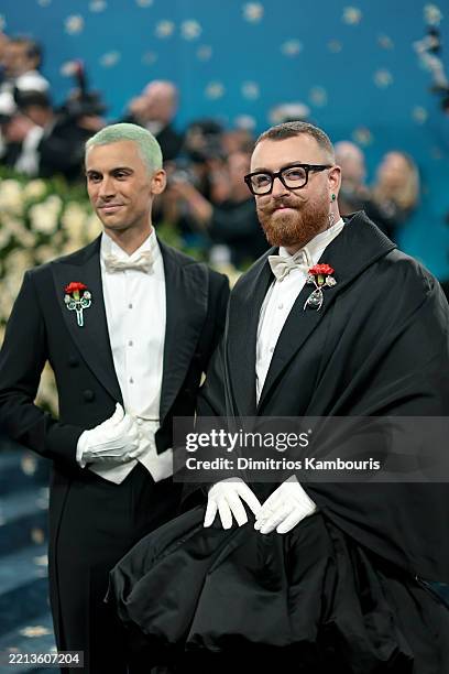 Christian Cowan and Sam Smith attend the 2025 Met Gala Celebrating "Superfine: Tailoring Black Style" at Metropolitan Museum of Art on May 05, 2025...