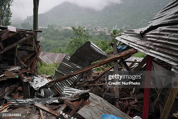 Damaged shop is seen in Uri town, Baramulla district, north of Srinagar, Indian-administered Kashmir, on May 9 after it is hit by an artillery shell...