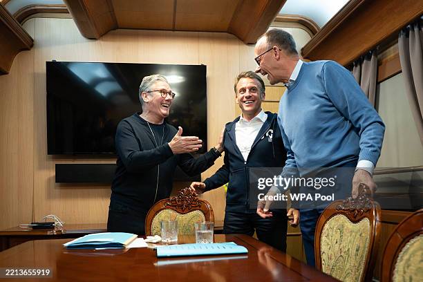 Prime Minister Sir Keir Starmer meets with French President Emmanuel Macron and German Chancellor Friedrich Merz onboard a train to the Ukrainian...