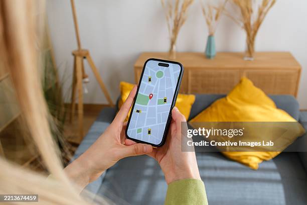 navigating urban streets with smartphone gps - location tracking stock pictures, royalty-free photos & images