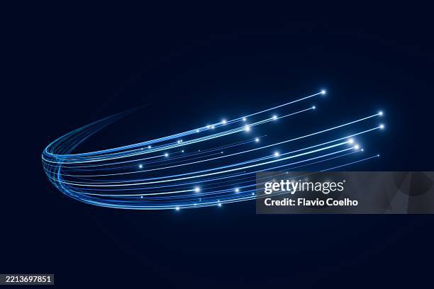 fiber optic speed in motion - lichtspur stock-fotos und bilder