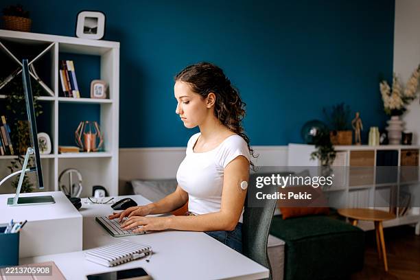 young woman working remotely - type 1 diabetes stock pictures, royalty-free photos & images