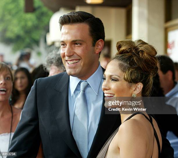 Actress Jennifer Lopez and actor Ben Affleck attend the premiere of Revolution Studios' and Columbia Pictures' film "Gigli" at the Mann National...