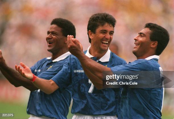 BEBETO OF BRAZIL IS JOINED IN HIS SAMBA CELEBRATIONS BY ROMARIO RIGHT AND MAZINHO LEFT AFTER SCORING THE SECOND GOAL AGAINST HOLLAND DURING THE 1994...