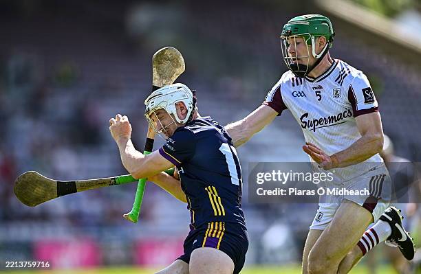 Galway , Ireland - 10 May 2025; Cathal Dunbar of Wexford in action against Cianan Fahy of Galway during the Leinster GAA Hurling Senior Championship...