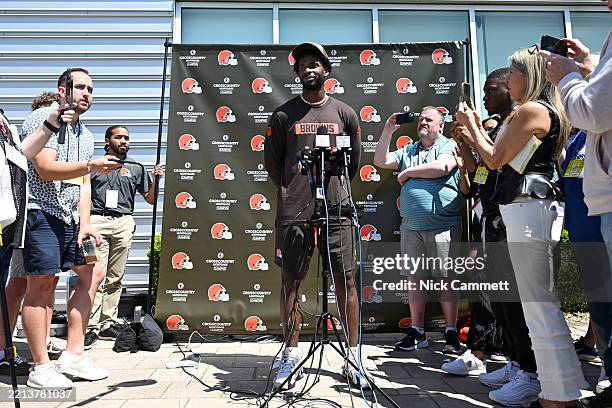 Shedeur Sanders of the Cleveland Browns answers questions from the media during a press conference prior to rookie minicamp at CrossCountry Mortgage...