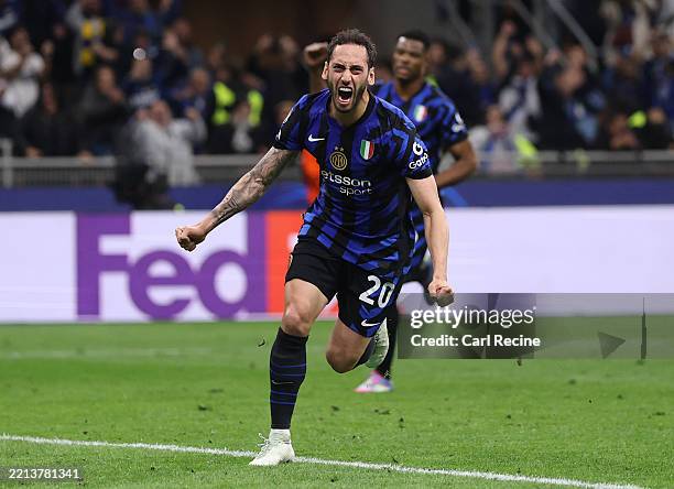 Hakan Calhanoglu of FC Internazionale celebrates scoring his team's second goal from the penalty spot during the UEFA Champions League 2024/25 Semi...