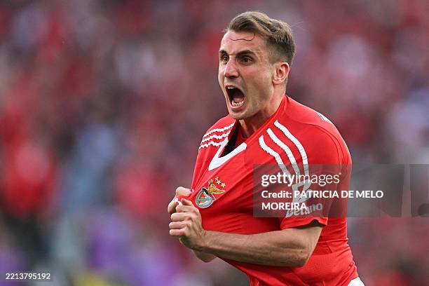 Benfica's Turkish midfielder Muhammed Akturkoglu celebrates scoring their first goal during the Portuguese League football match between SL Benfica...