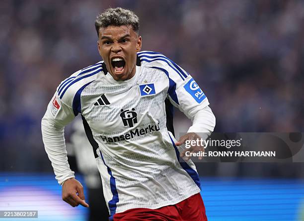 Hamburg's Ghanaian forward Ransford Konigsdoerffer celebrates scoring his team's second goal during the German second division Bundesliga football...