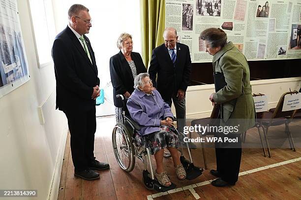 Princess Anne, Princess Royal meets Nellie Le Feuvre, who was deported to Biberach Camp in Germany, during a visit to an exhibition on World War II...