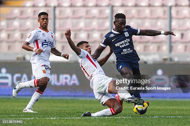 Rodrigo Tapia of Atletico Grau fights for the ball with Eryc Castillo of Alianza Lima during a Liga 1 Profesional Peru match between Atletico Grau...