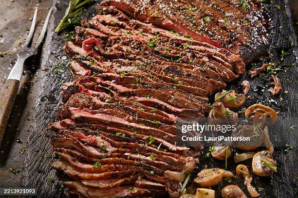 succulent medium rare flank steak - bison meat stock pictures, royalty-free photos & images