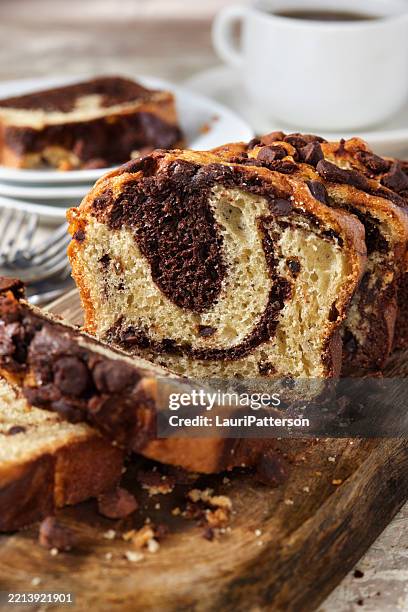 chocolate marble pound cake - chocolate chip bundt cake stock pictures, royalty-free photos & images