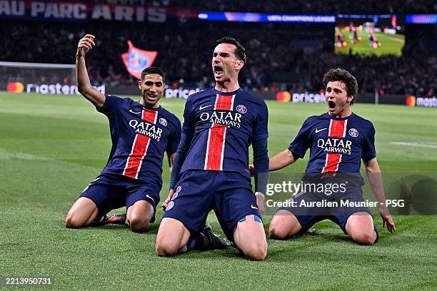 Fabian Ruiz of Paris Saint-Germain celebrates after scoring with teammates Achraf Hakimi and Joao Neves during the UEFA Champions League 2024/25 Semi...